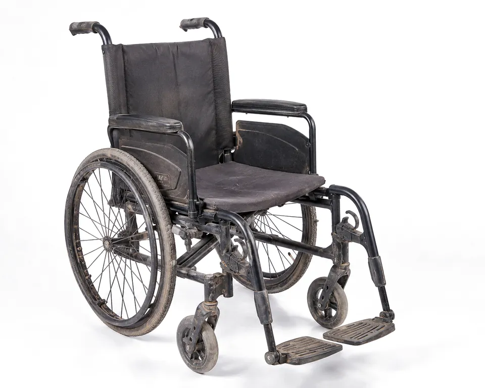 Wheelchair before cleaning.